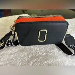 Marc Jacob Snapshot.  Elegant Gold and Cream Orange Crossbody Bag